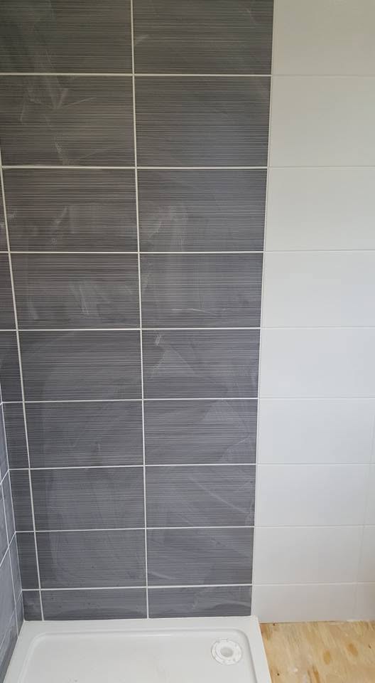 Large format bathroom tiling with precise alignment